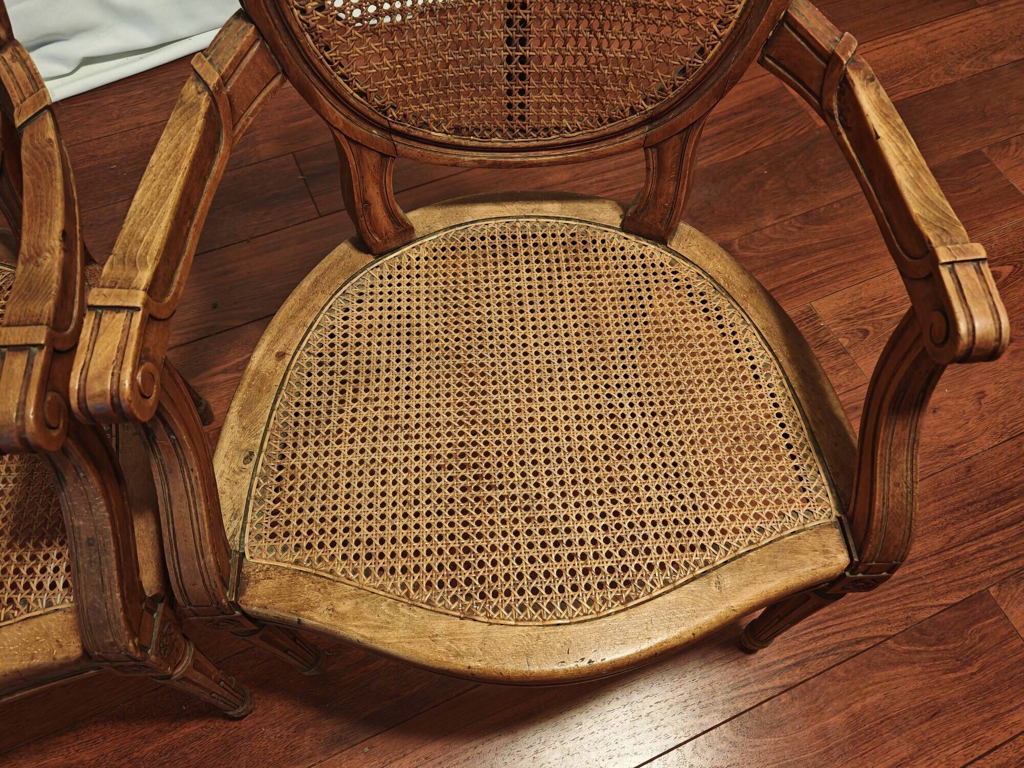 Caned armchairs