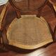 Caned armchairs