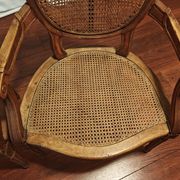 Caned armchairs