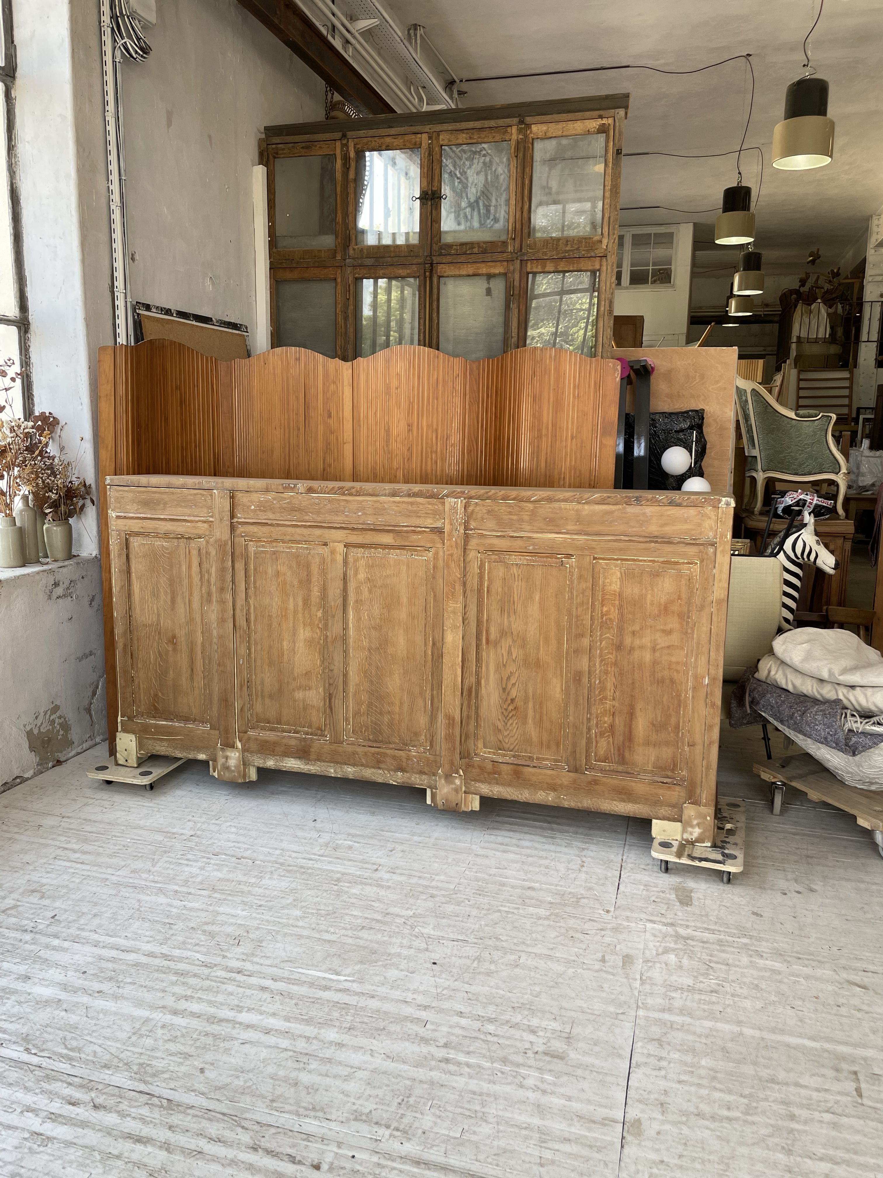 Large row of solid oak loom sliding doors