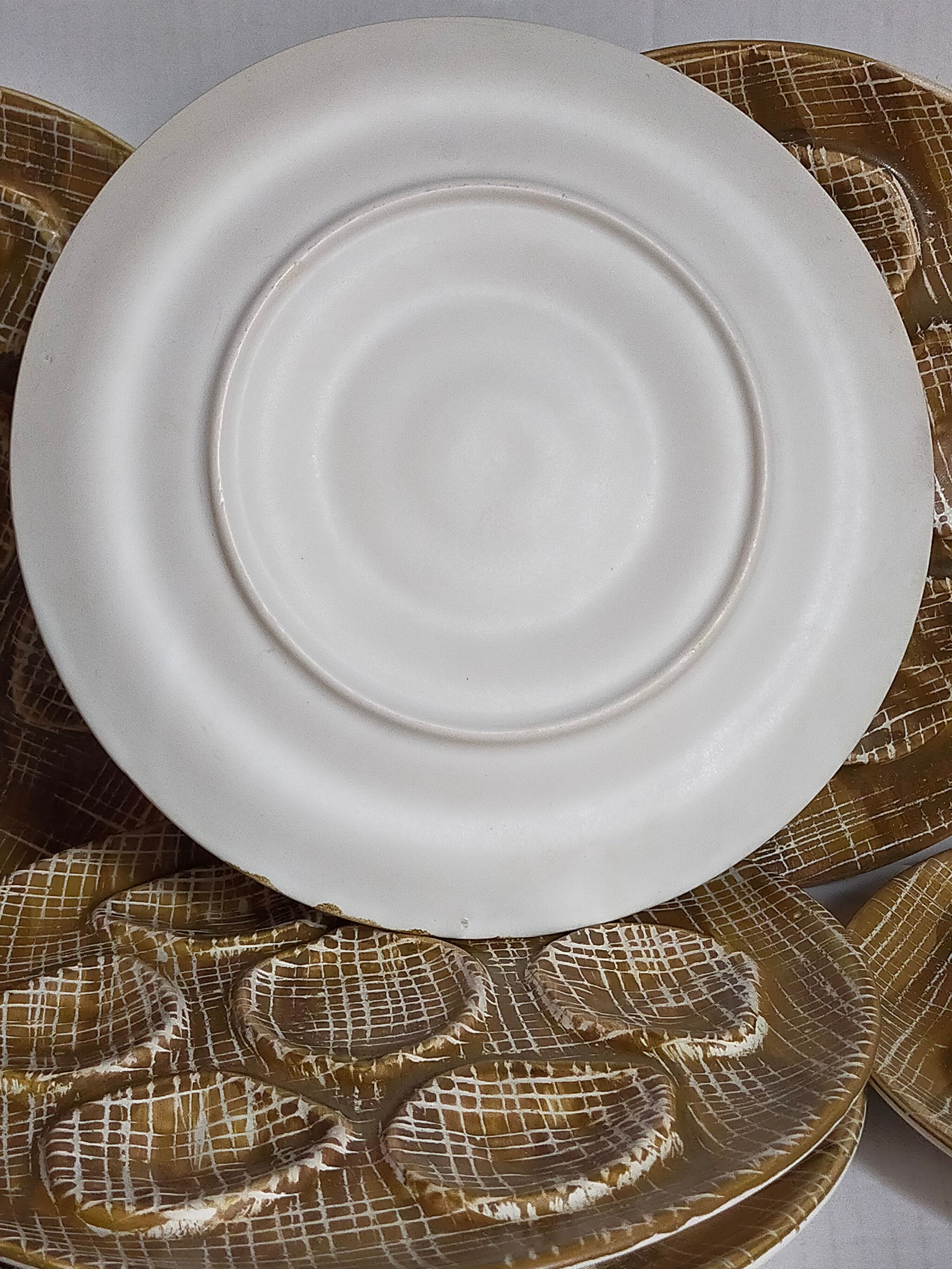 Six oyster plates earthenware with matte enamel, 50s