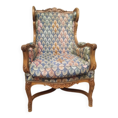Bergere à oreilles en bois sculpté de style régence