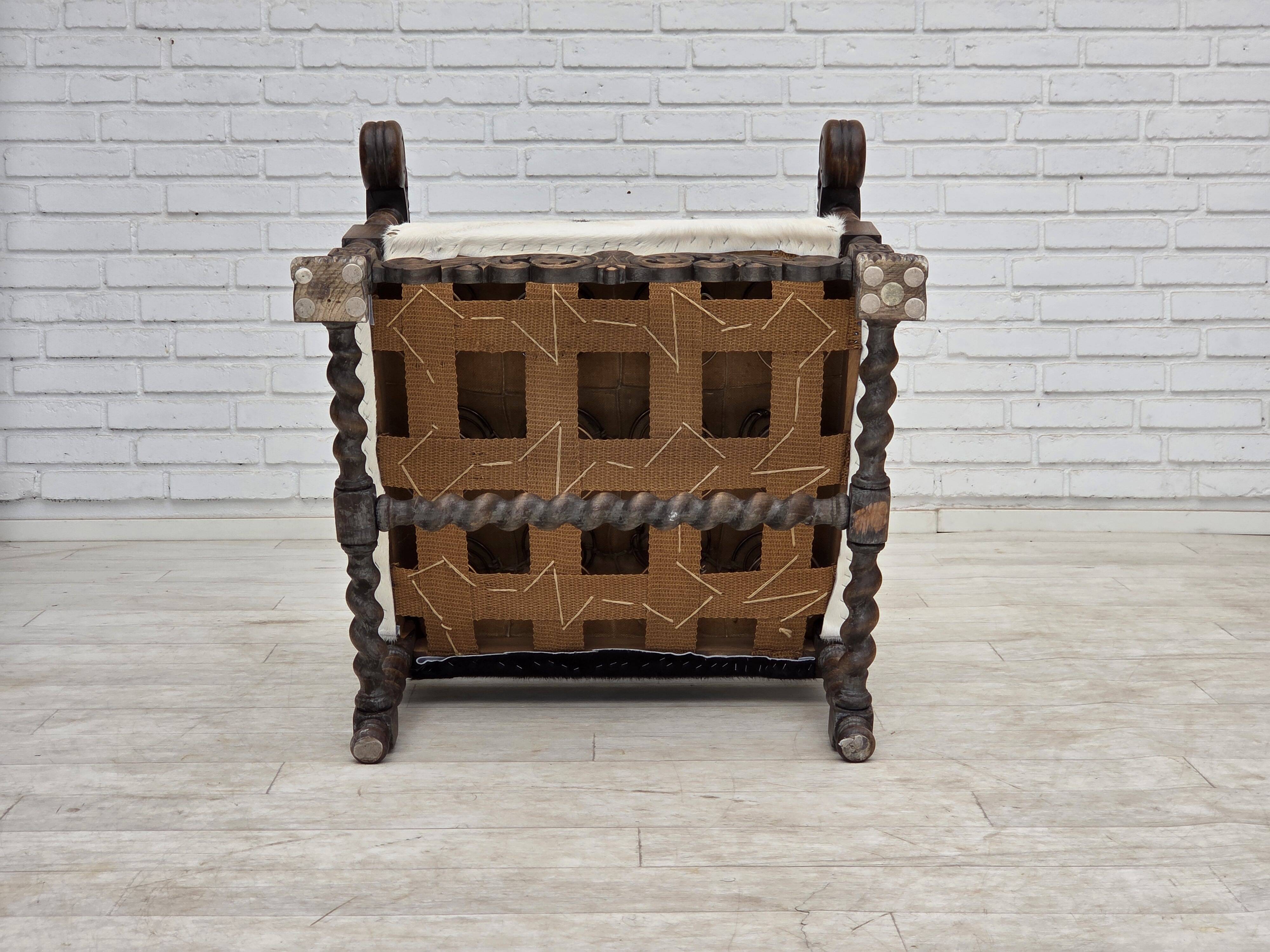 1950s, Danish highback armchair, genuine cowhide, oak wood.