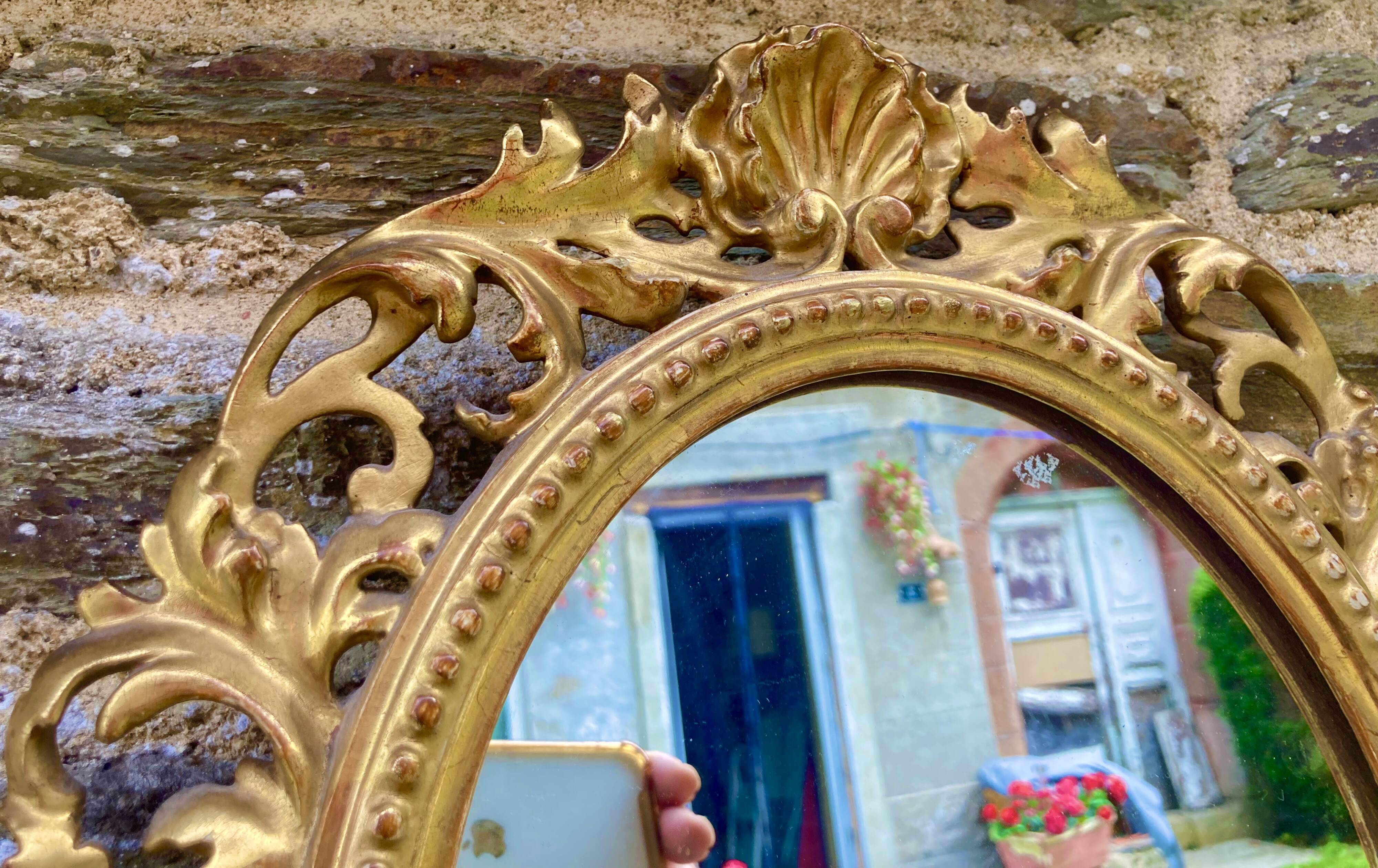 Mirror in carved wood gilded with leaf, Louis XV period, 18th century