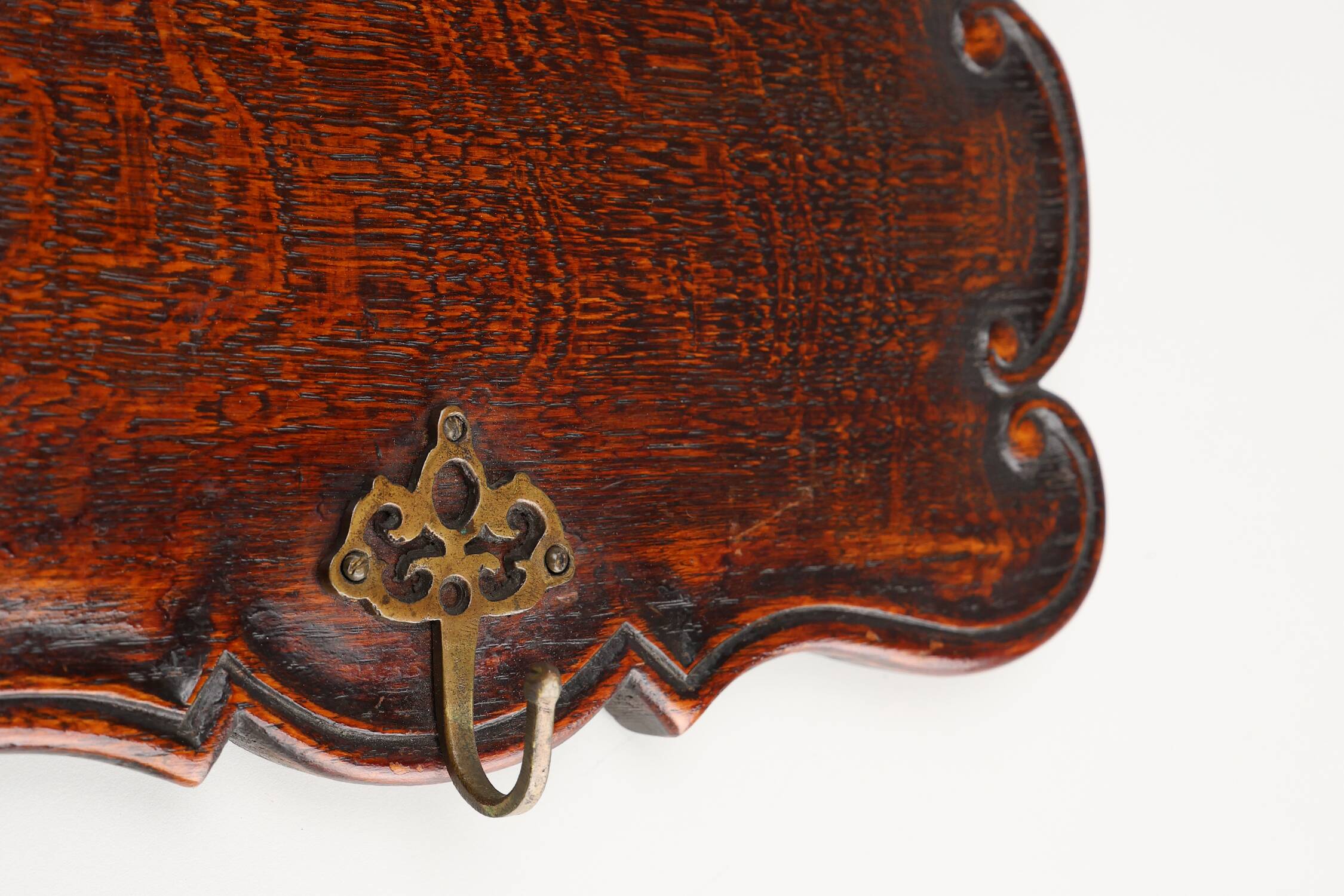 Art Nouveau style coat rack in oak with brass hooks, France ca. 1915