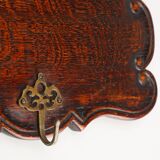 Art Nouveau style coat rack in oak with brass hooks, France ca. 1915