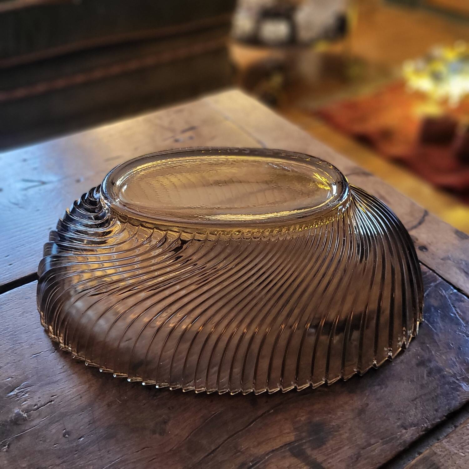 Smoked glass bowl with a radiating embossed pattern — 1970s