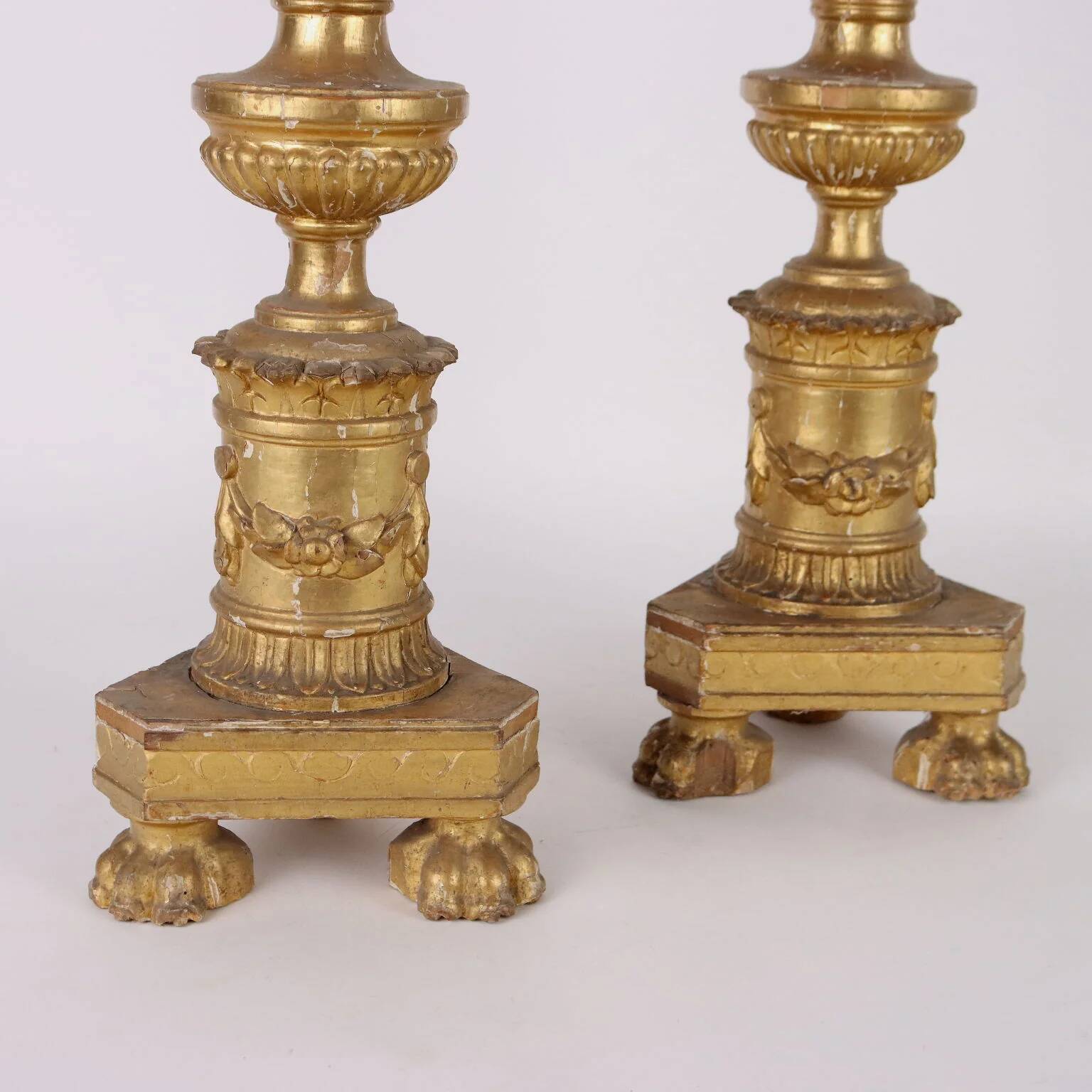 Pair of antique Empire candlesticks in wood, Europe, early 19th century.