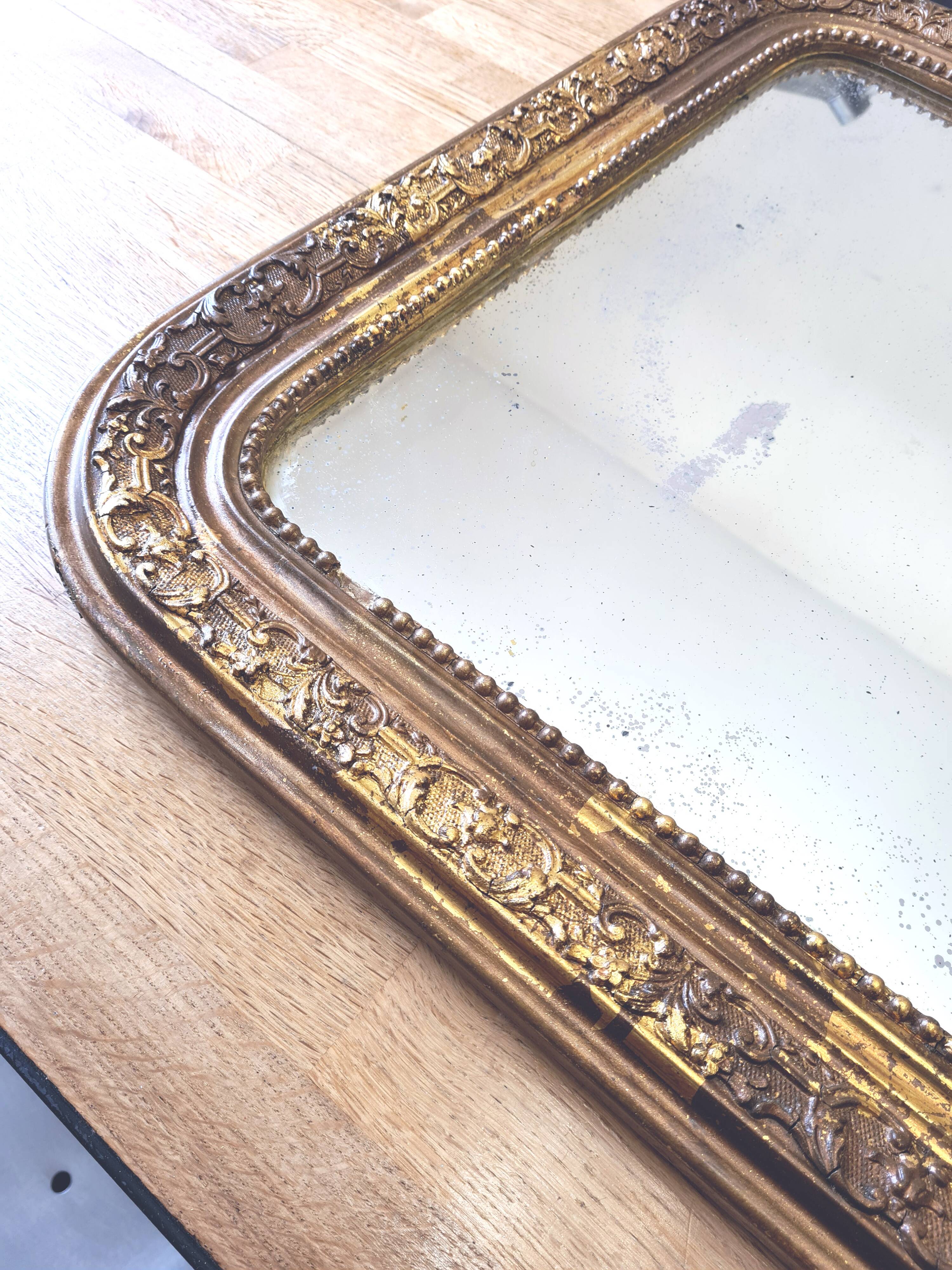 Old Louis Phillipe mercury mirror, in gilded stucco.