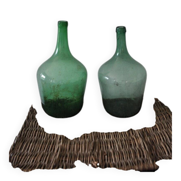 Pair of vintage green glass bottles — Hungarian carboys from the 1960s.