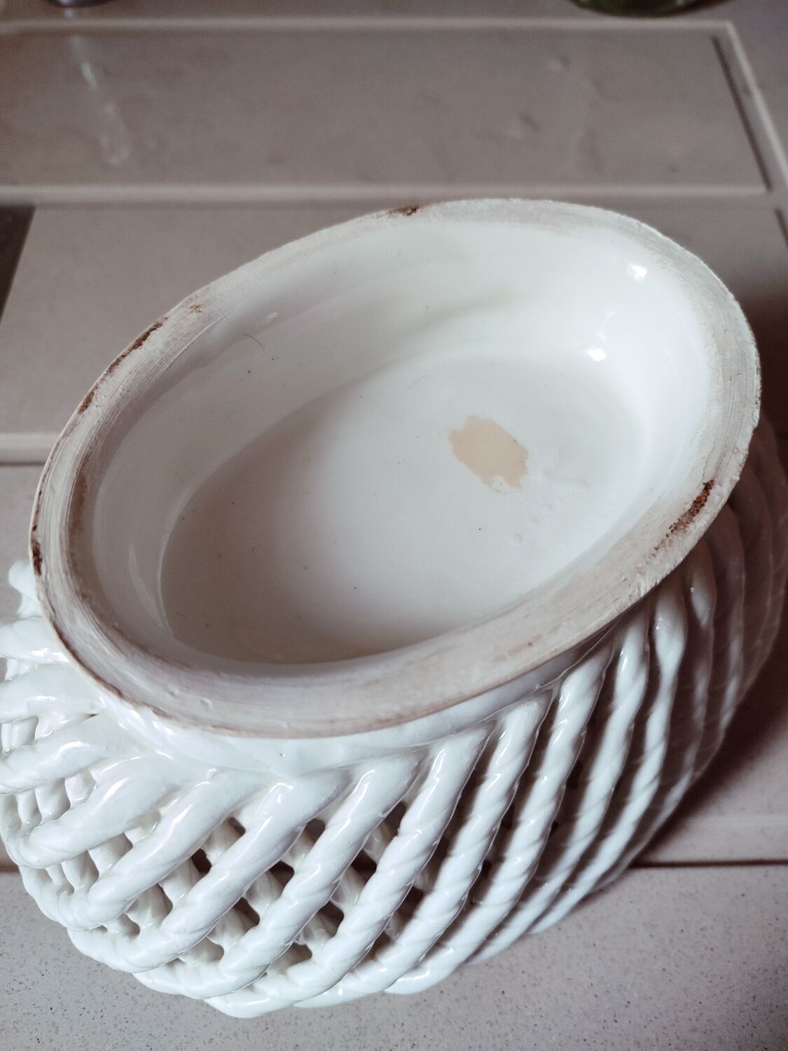 Braided earthenware cup