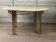 Dining table in chromed metal and matt gold, travertine shelf circa 1980