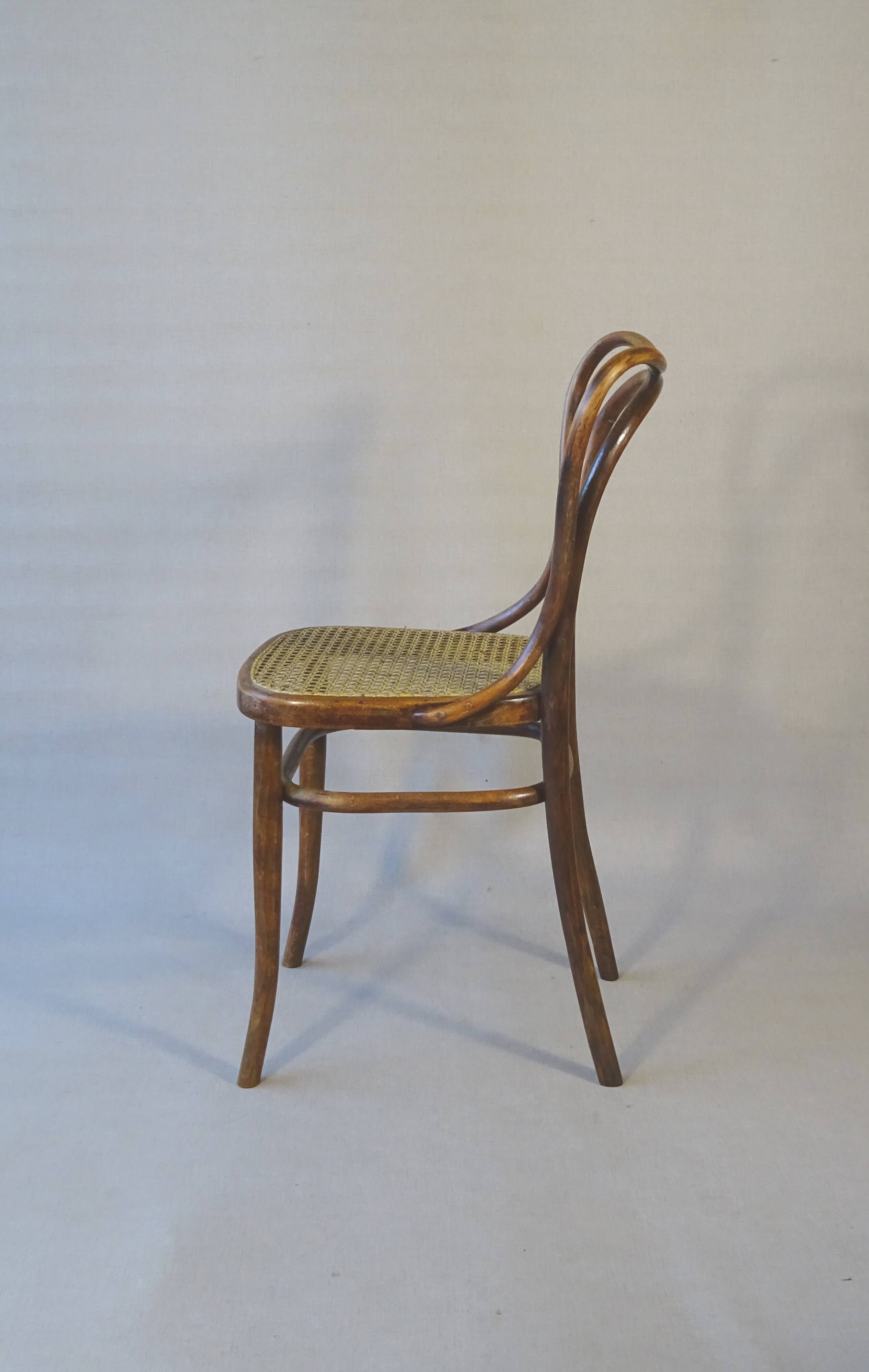 2 Bistro chairs No. 55- 3/4 by Kohn, circa 1905, caned