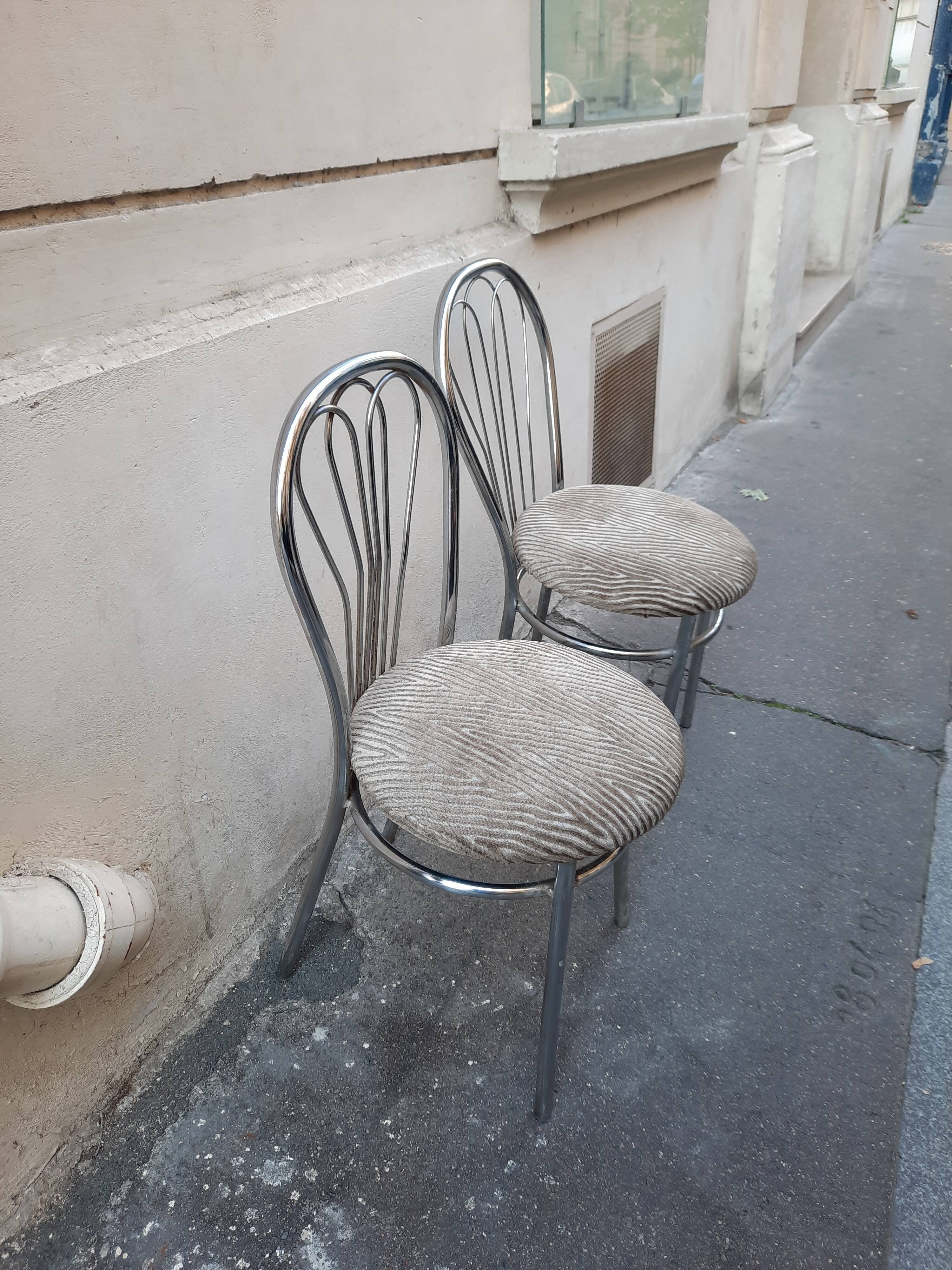 Pair of tubular metal bistro chairs
