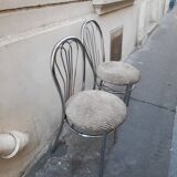 Pair of tubular metal bistro chairs