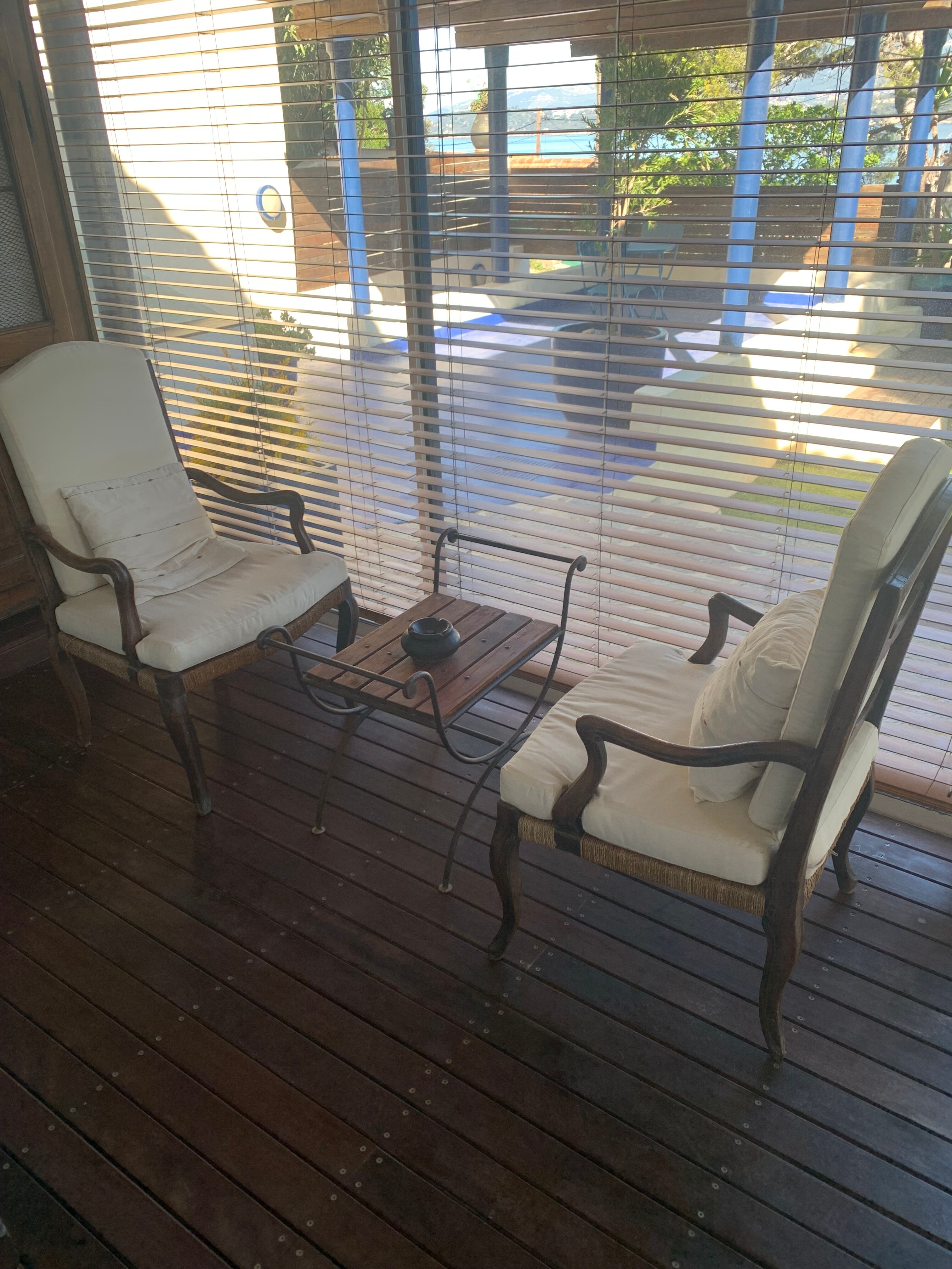 Pair of Louis XV style armchairs in walnut with rush seating.