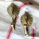 Pair of solid brass double patères