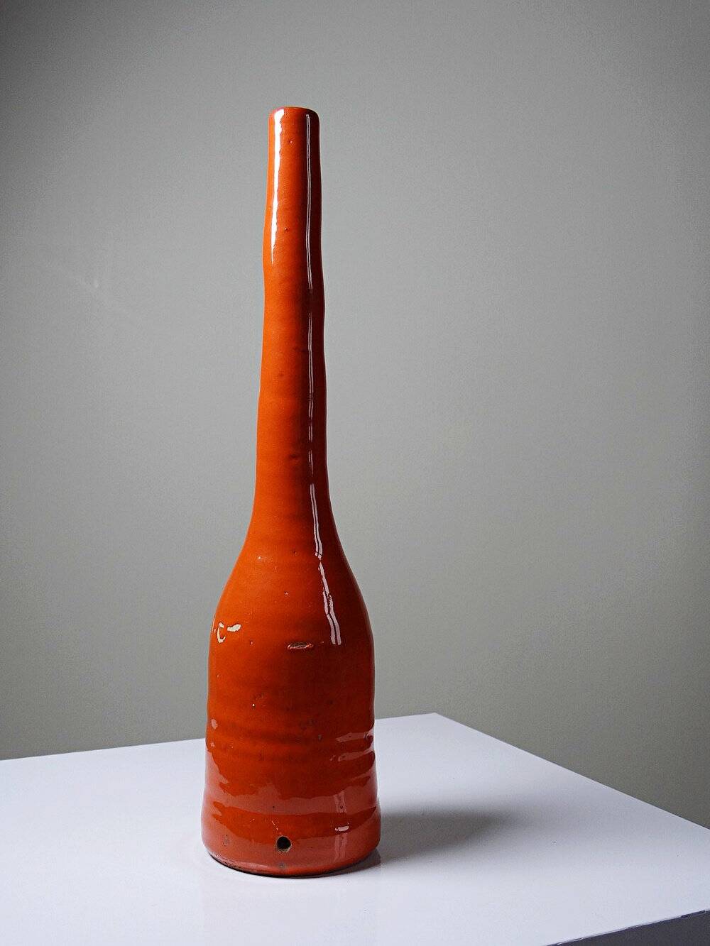 Bright orange mid-century decorative bottle lamp base glazed pottery.