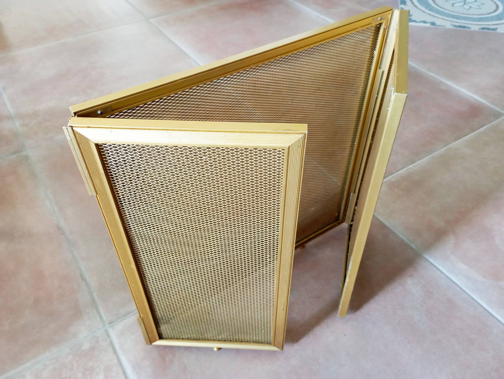 Gold metal fire screen