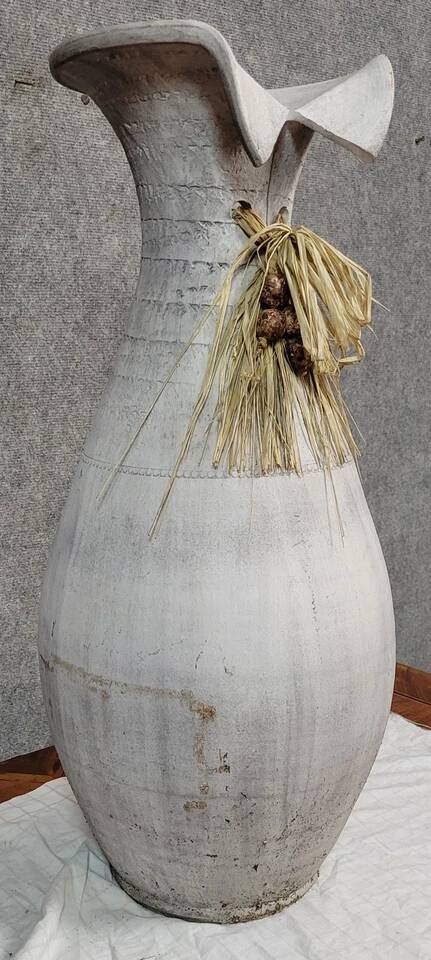 Vintage whitewashed pottery and wicker vase circa 1980