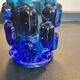 Duo of Art Deco candlesticks in blue glass paste