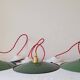 Trio of enameled sheet metal pendant lights