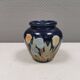 Small delicious blue ceramic vase with floral decoration. Sweden 1970s