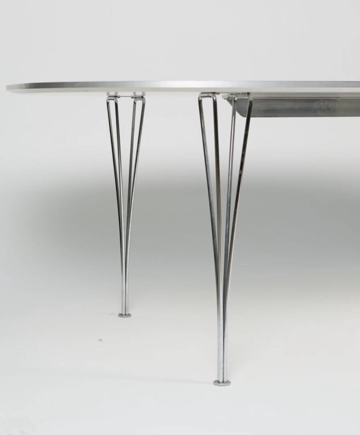 Dining table by Bruno Mathsson and Piet Hein
