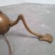 Art and Craft tripod floor lamp in bronze.