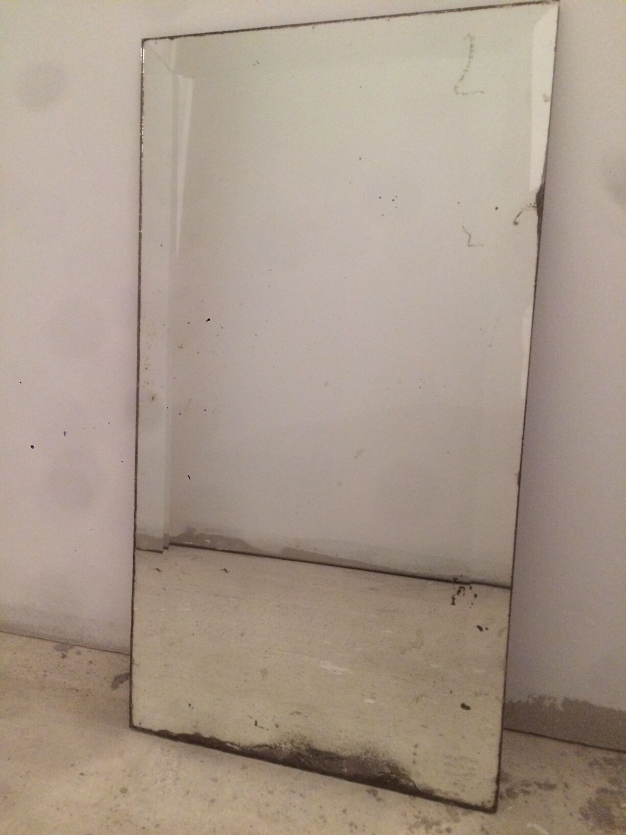 Old bevelled mirror 51x27,5cm