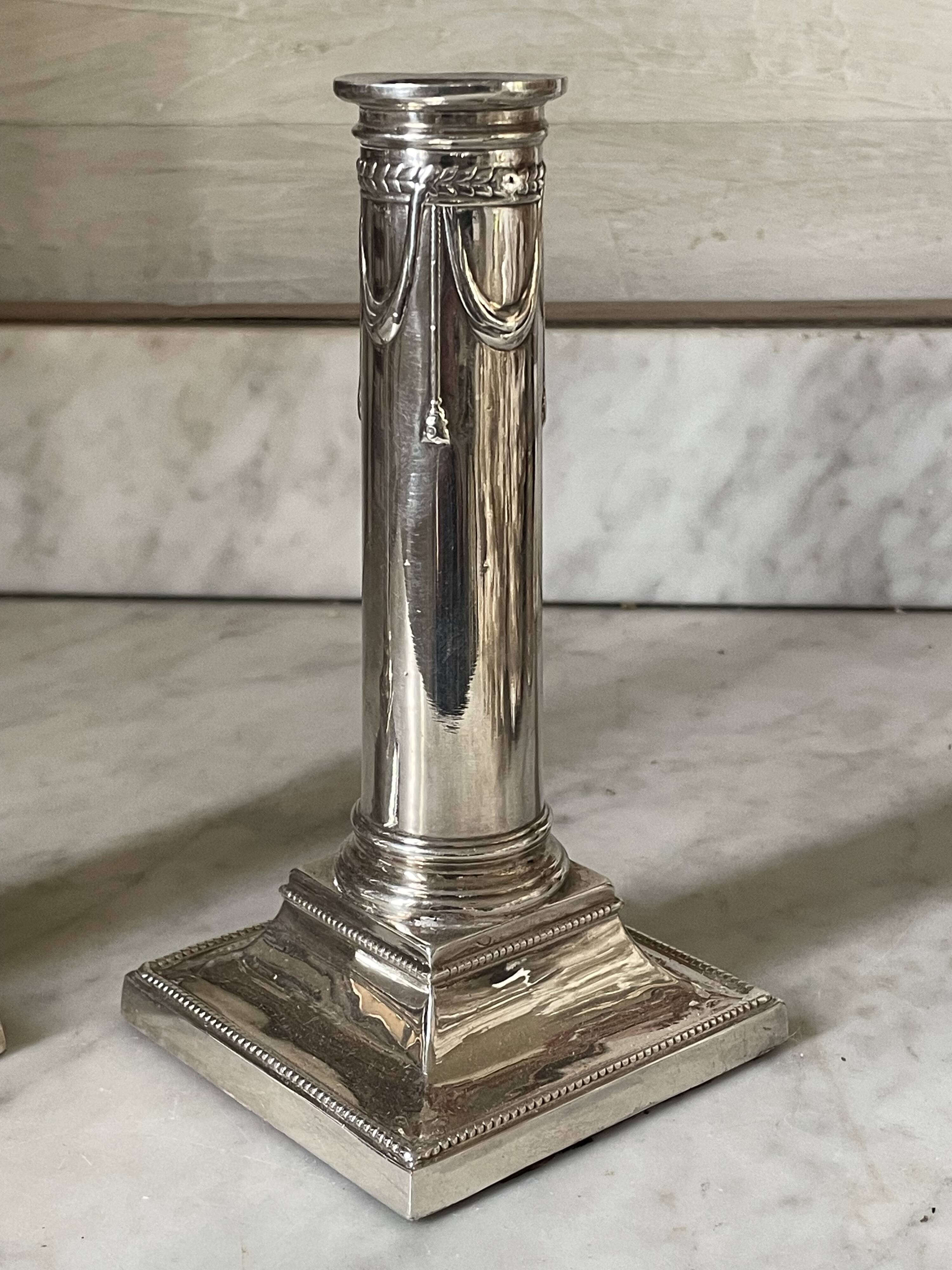pair of Victorian style silver-plated candlesticks