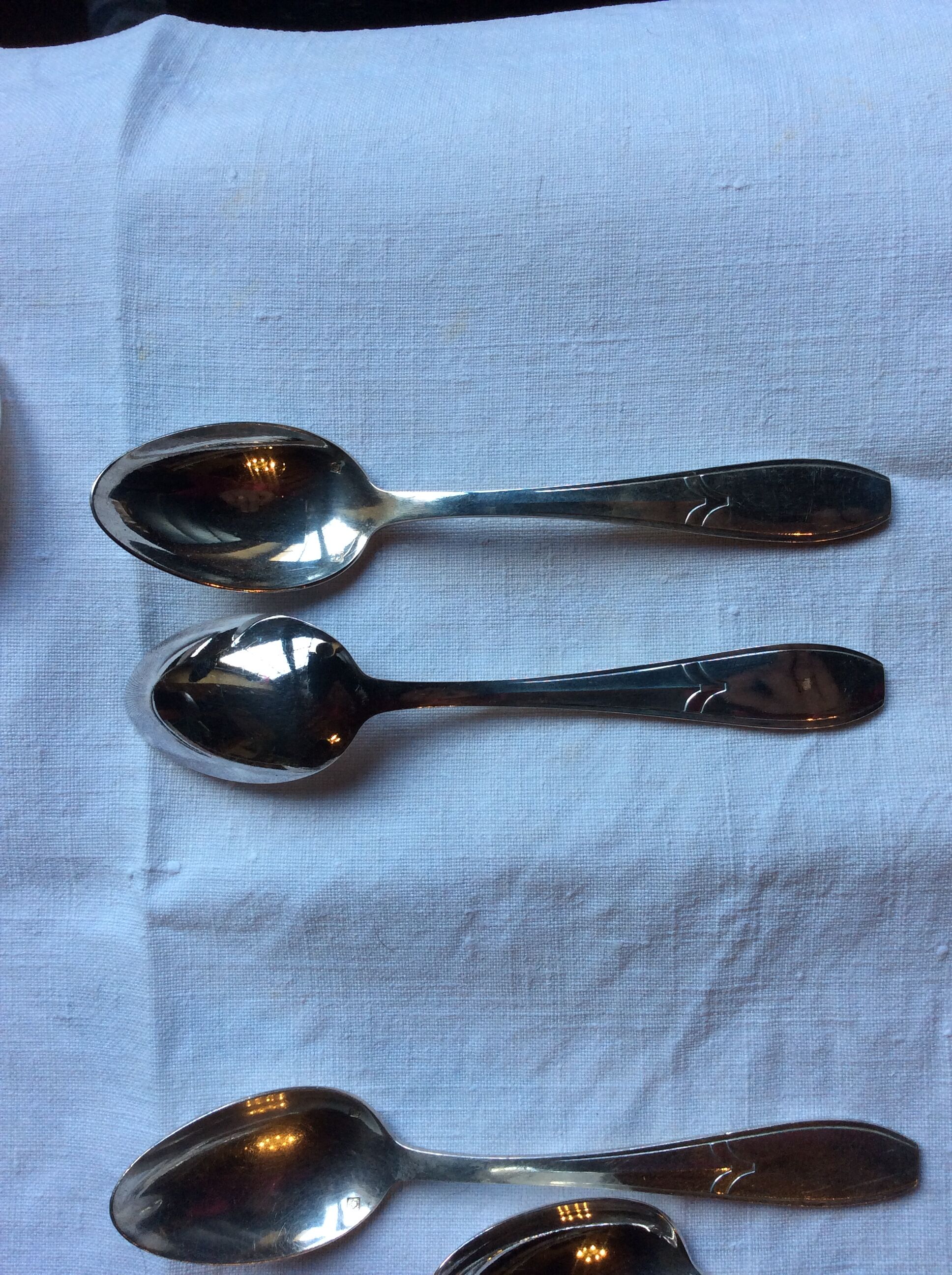 12 small art deco spoons, silver metal