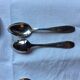 12 small art deco spoons, silver metal