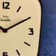 Formica vintage clock silent wall clock "Yellow electro star"