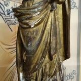 Ancient statue of the Virgin and Child in polychrome and gilded carved wood.