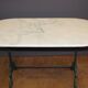 Bistro table in marble and cast iron around 1900