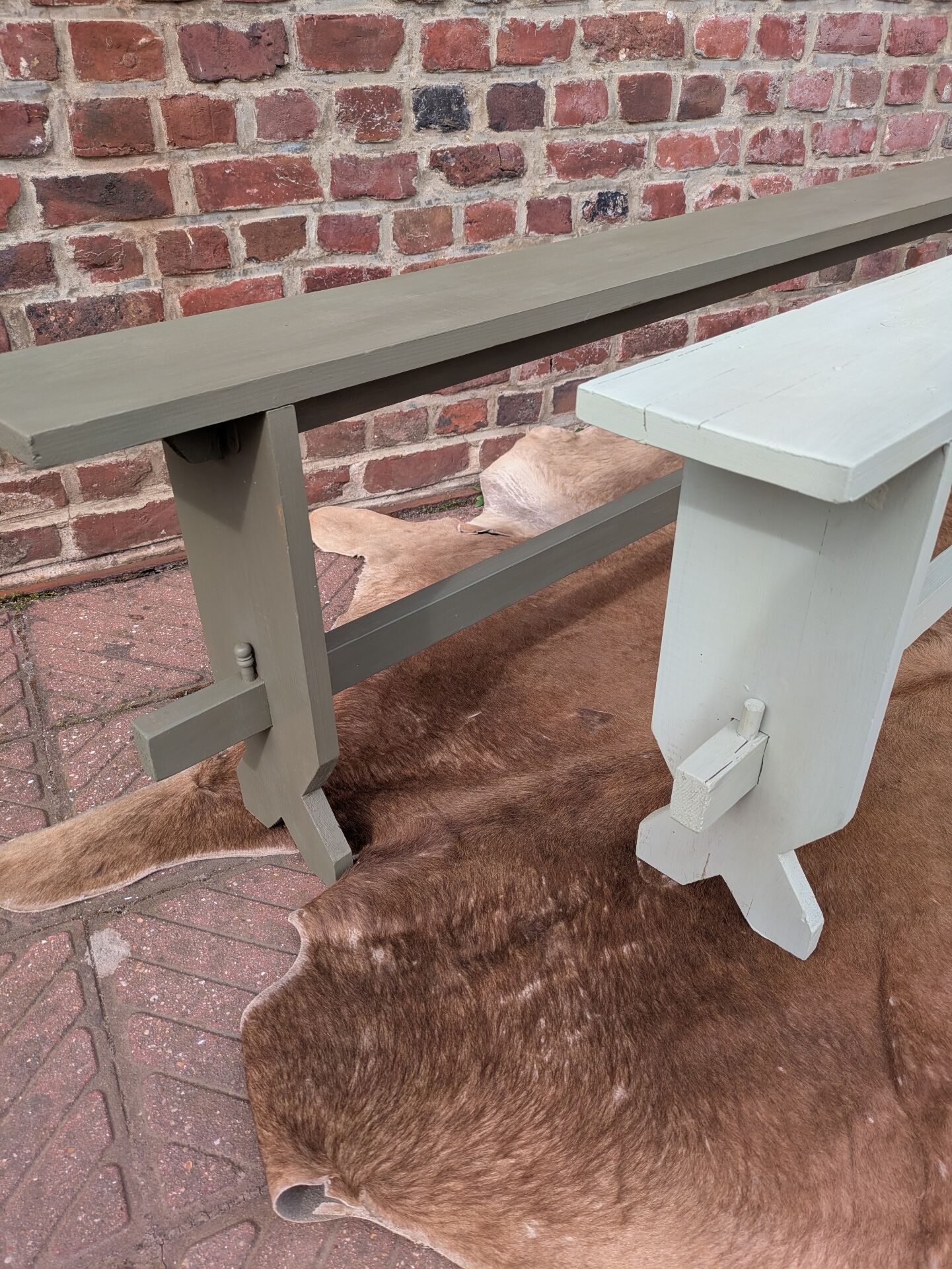 Pair of patinated benches