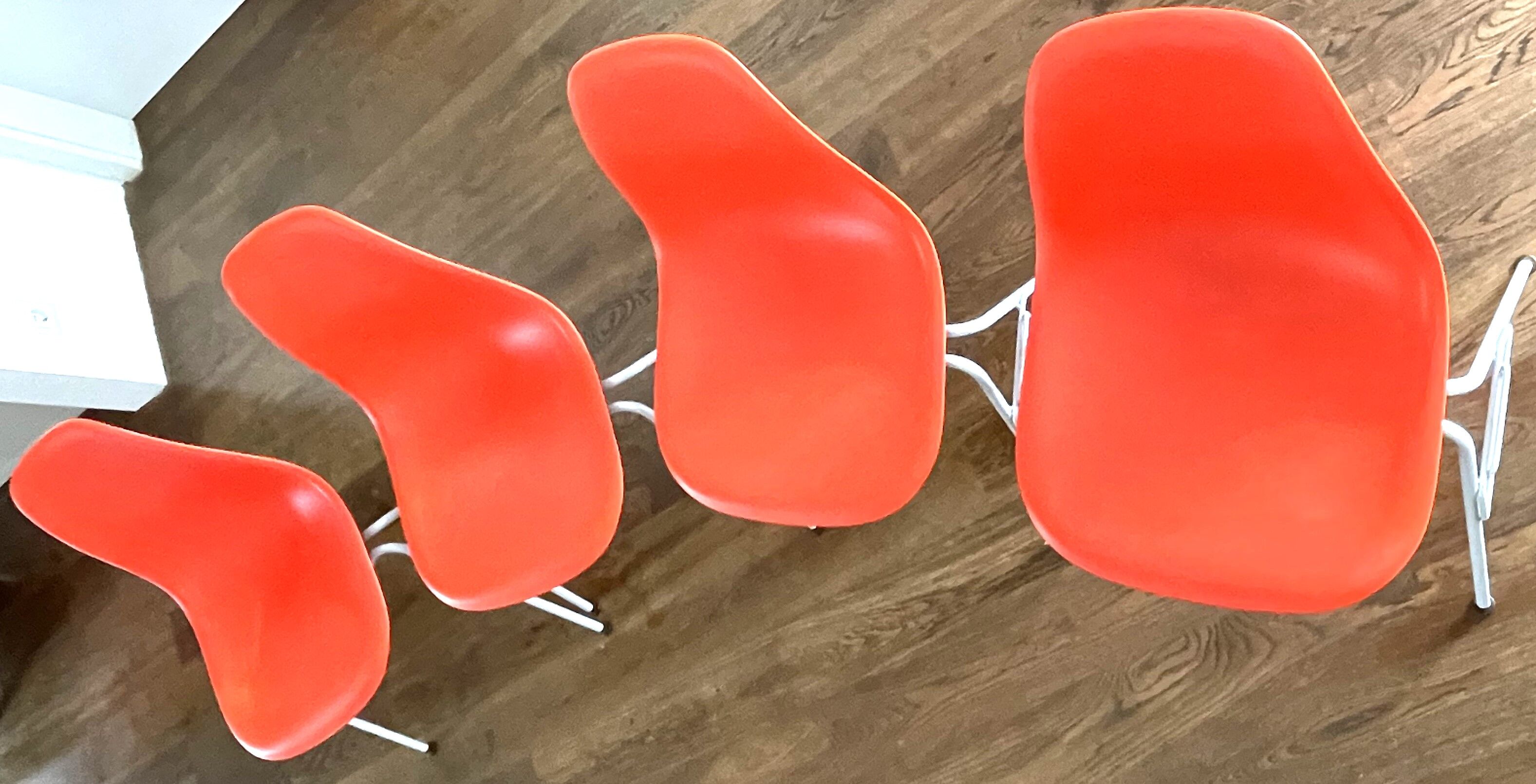 4 Charles Eames DSS chairs for Vitra, Poppy Red