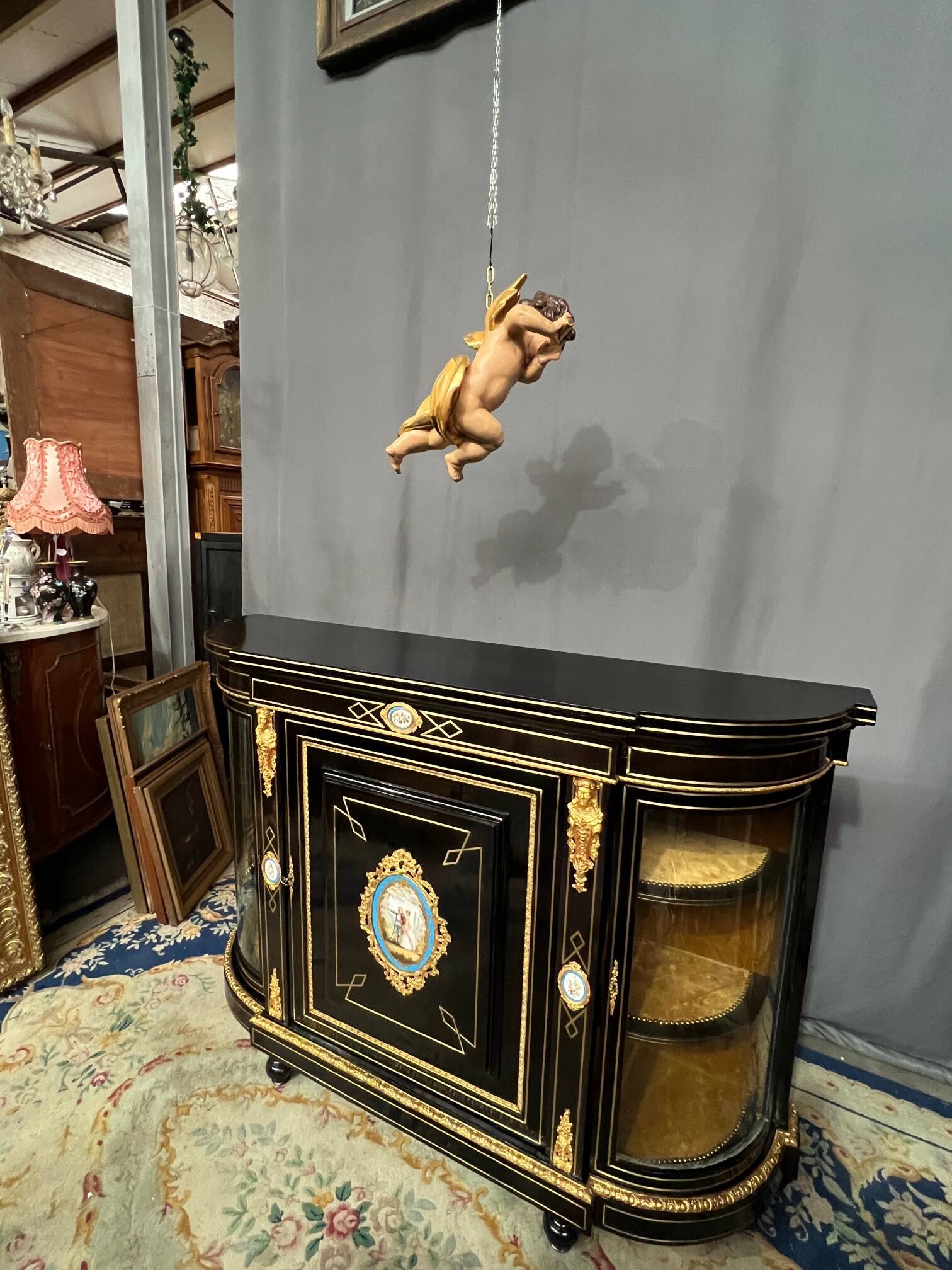 Napoleon III style credenza with four Sèvres medallions.