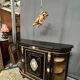Napoleon III style credenza with four Sèvres medallions.