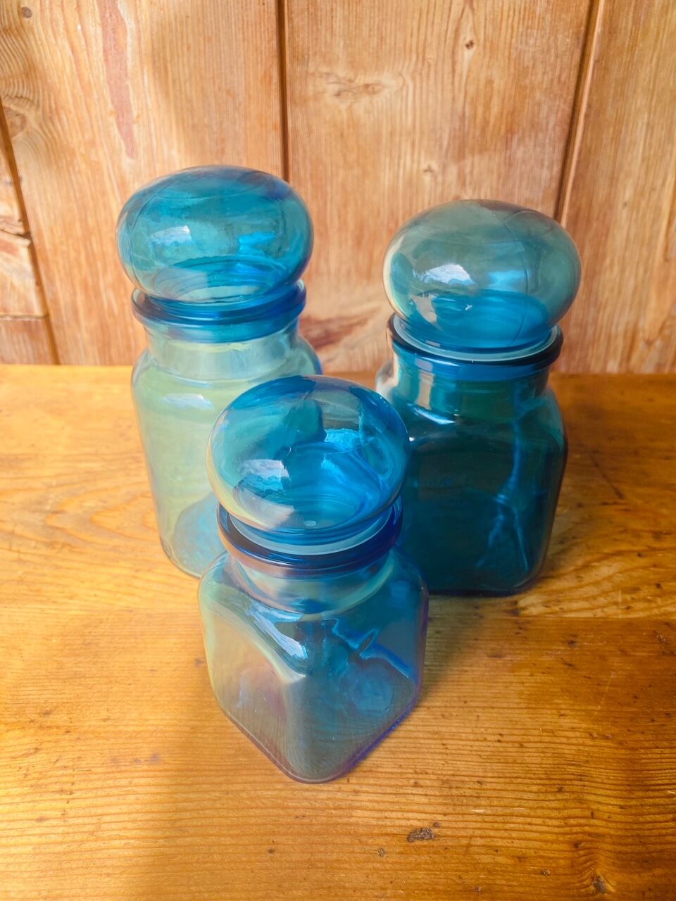 Trio of jars apothecary bottle in blue glass with round cap