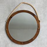 Vintage round wooden wall mirror with hooks
