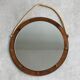 Vintage round wooden wall mirror with hooks