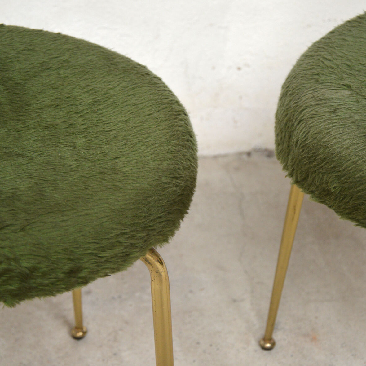 Pair of green Pelfran chairs
