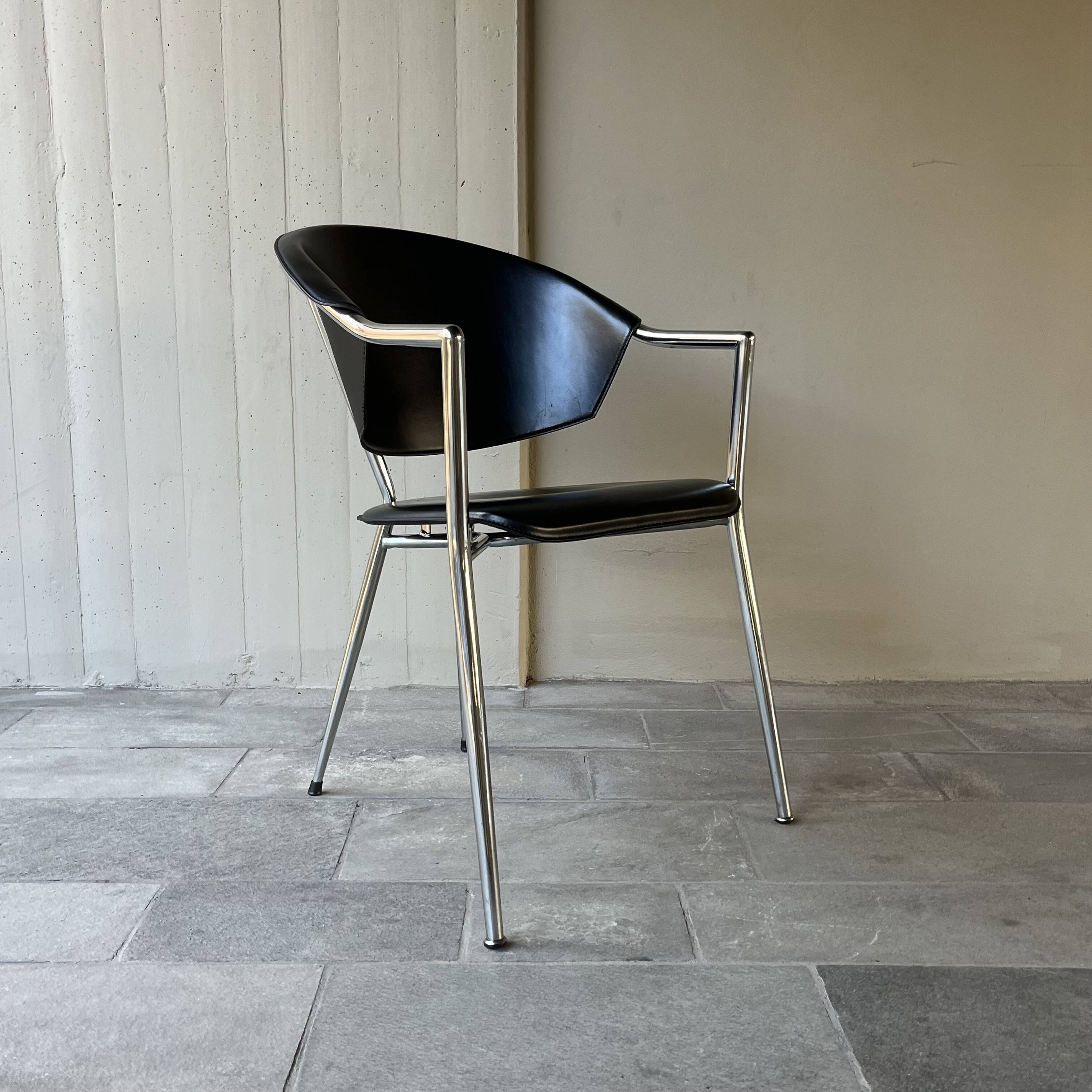 Set of four Italian black leather chairs, 1970