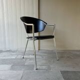 Set of four Italian black leather chairs, 1970