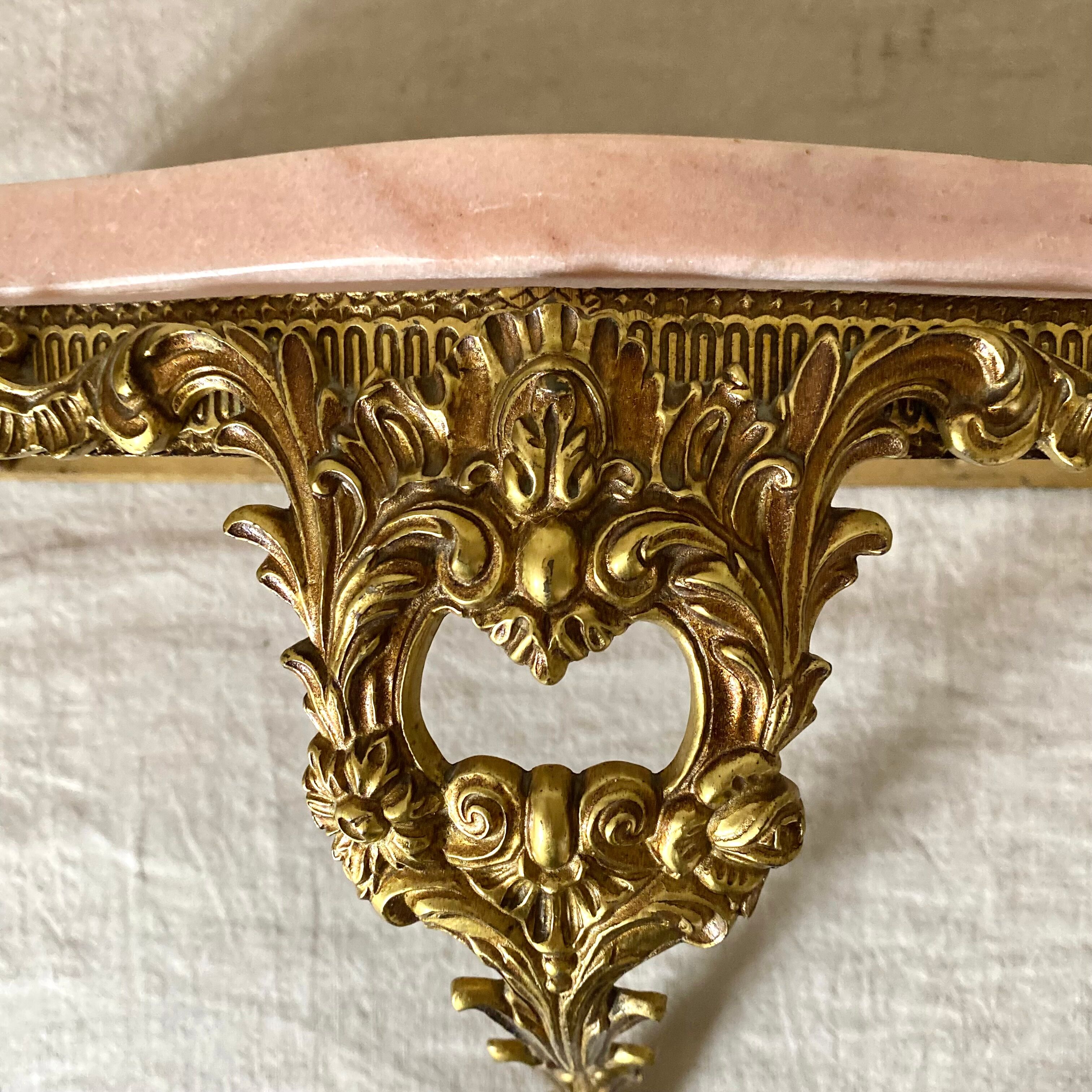 Baroque style wall console in pink marble and gilded metal