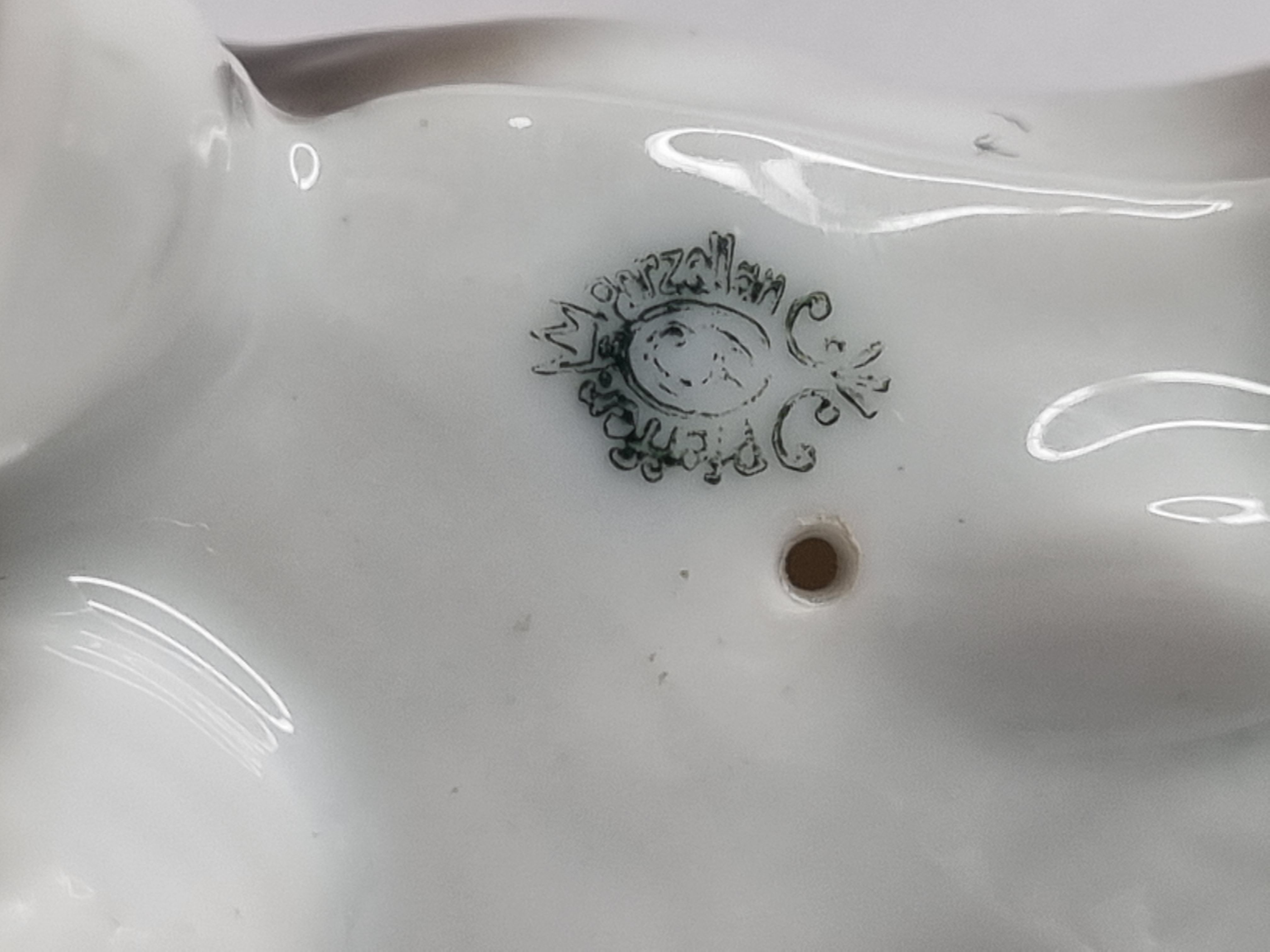 Set of three porcelain puppies
