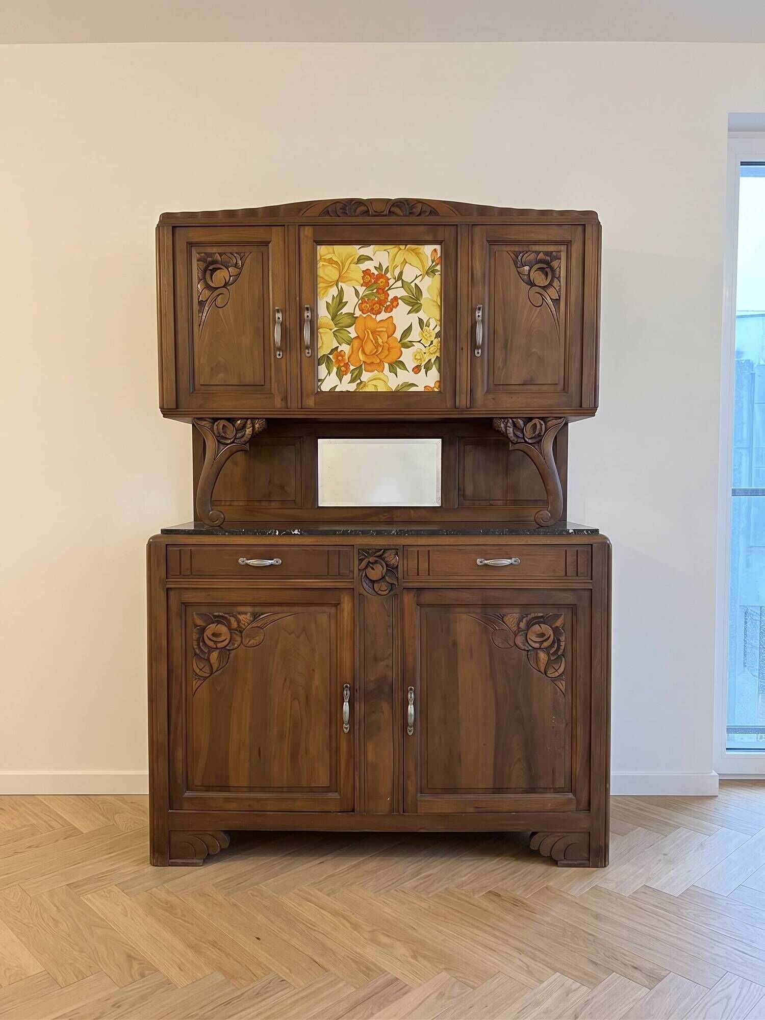 Antique Art Nouveau display cabinet in carved wood with marble top.