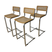3 tabourets de bar cannés en chrome et cannage